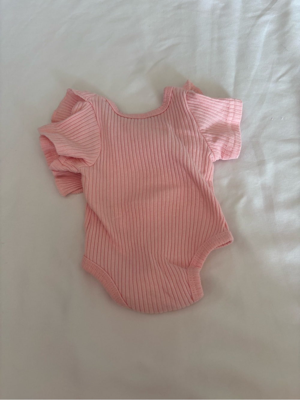 Soft Pink Ribbed Ruffle Baby Bodysuit with Button Detail - Picture 2 of 2